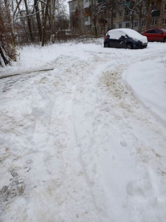 Нижегородцы закидывают мэра фото и видео с нечищеными от снега улицами - фото 11